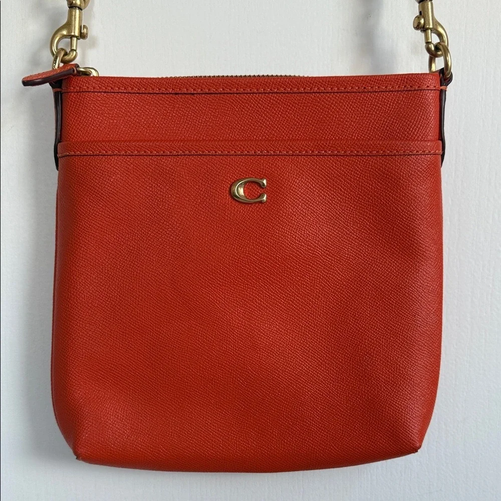 Coach Orange Pebble Leather Crossbody Bag With Front Pocket